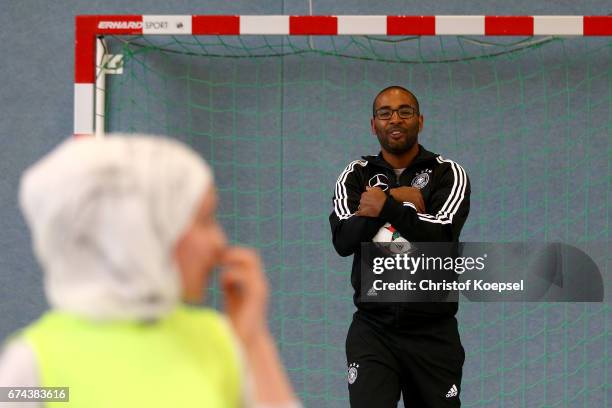 Cacau, DFB Integration ambassador does a training session with refugees at Janusz-Korczak School on April 28, 2017 in Voerde, Germany.