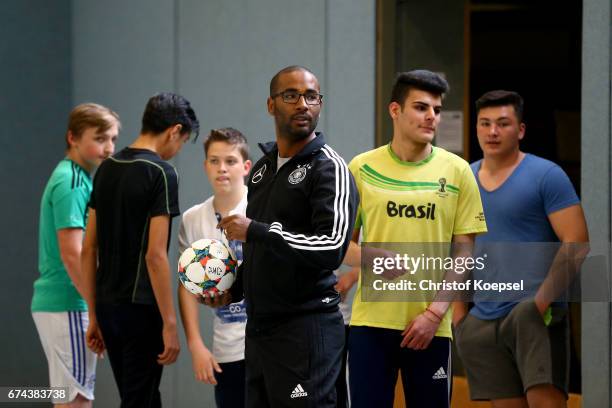 Cacau, DFB Integration ambassador does a training session with refugees at Janusz-Korczak School on April 28, 2017 in Voerde, Germany.