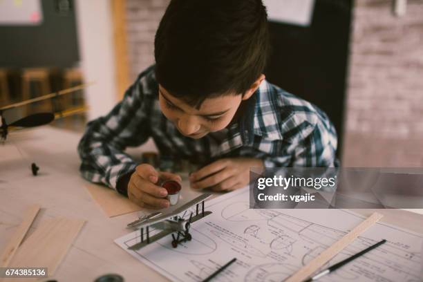 Boy Making Model Kit Kids Making Models Photos and Premium High Res Pictures - Getty Images