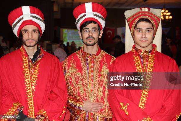 Men dressed in traditional attire during Nevruz celebrations in Toronto, Canada. Nevruz which means 'new day' marks the first day of Spring, and is...