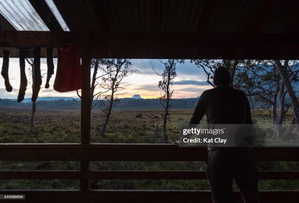 Man watching sunset on the Overland Track