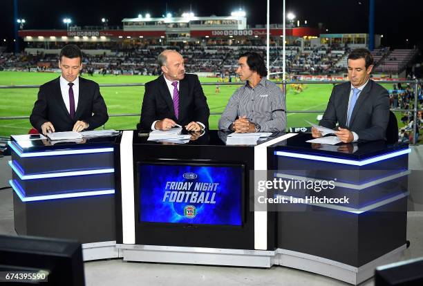 Television commentators from channel nine Wally Lewis Johnathan Thurston of the Cowboys and Andrew Johns are seen before the start of the round nine...