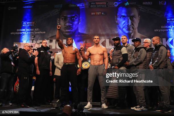 Anthony Joshua and Wladimir Klitschko pose during the weigh-in prior to the Heavyweight Championship contest at Wembley Arena on April 28, 2017 in...