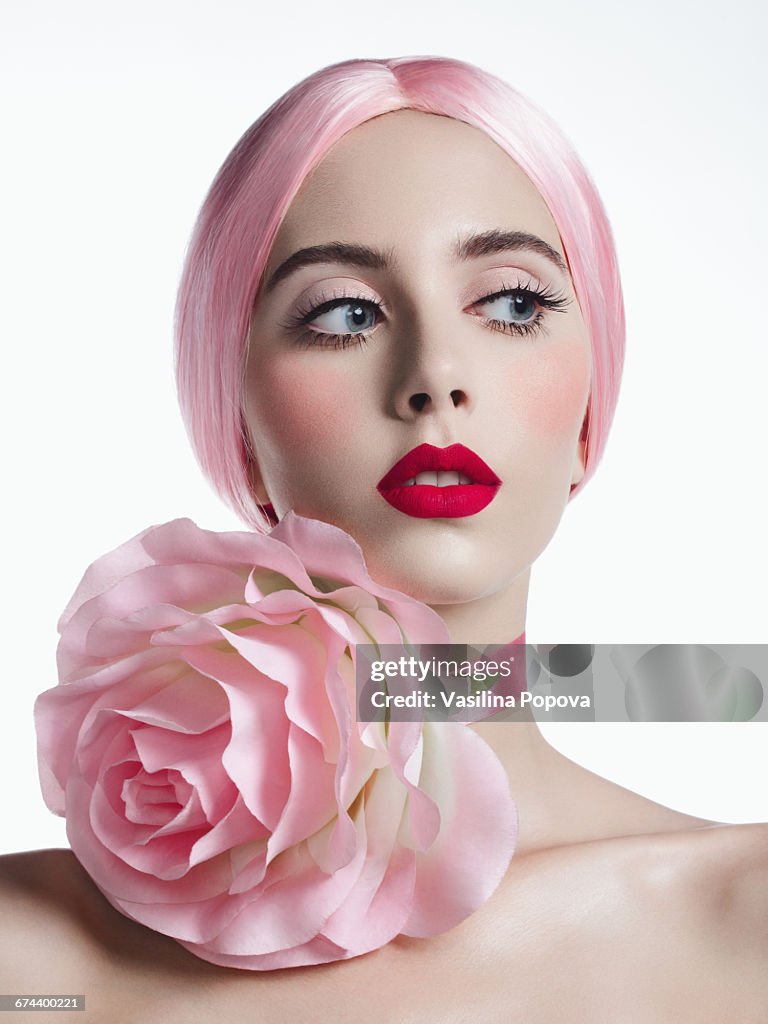 Young beautiful woman with flower choker