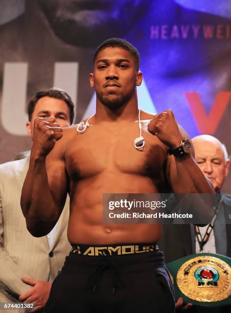 Anthony Joshua poses during the weigh-in prior to the Heavyweight Championship contest Wladimir Klitschko against at Wembley Arena on April 28, 2017...