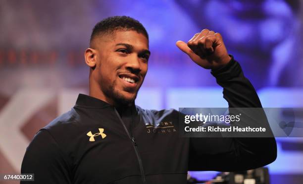 Anthony Joshua gives a thumbs up during the weigh-in prior to the Heavyweight Championship contest Wladimir Klitschko against at Wembley Arena on...
