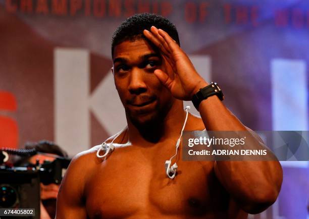 British boxer Anthony Joshua attends the weigh-in ahead of his world heavyweight title unification bout against Ukrainian boxer Wladimir Klitschko at...