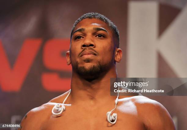 Anthony Joshua looks on during the weigh-in prior to the Heavyweight Championship contest Wladimir Klitschko against at Wembley Arena on April 28,...