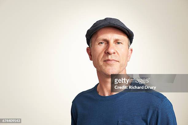 portrait of middle-aged man wearing hat - honesty stock pictures, royalty-free photos & images
