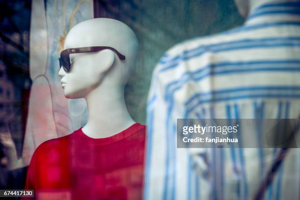 female mannequin in shop window with street reflection - fashion show bildbanksfoton och bilder