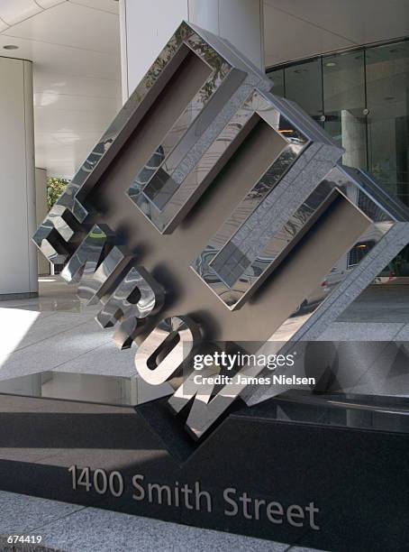 Logo stands in front of the new corporate headquarters of the Houston-based energy trading firm Enron November 29, 2001 in Houston, Texas. The energy...