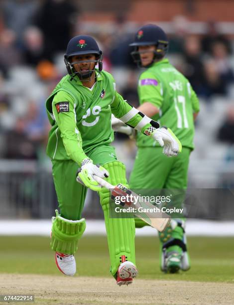 Haseeb Hameed of Lancashire runs between the wickets with Alex Davies during the Royal London One-Day Cup match between Lancashire and Leicestershire...