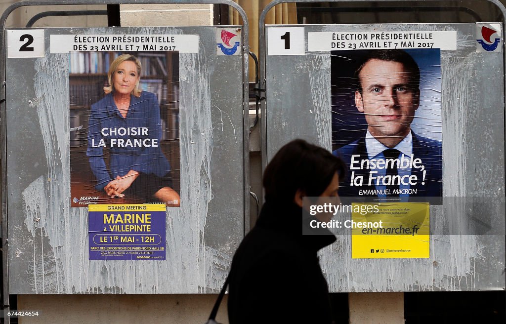 New Posters of France Presidential Candidates Emmanuel Macron And Marine Le Pen Are Displayed In Paris