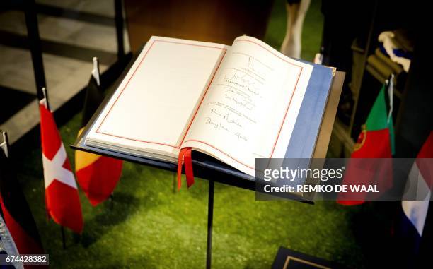 Picture taken on April 28, 2017 at the Royal Palace in Amsterdam, shows the Treaty of Maastricht during a press preview of an exhibition to celebrate...