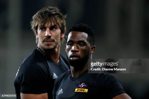 Siya Kolisi and Eben Etzebeth of the Stormers look on during team warm up ahead of the round 10 Super Rugby match between the Highlanders and the...