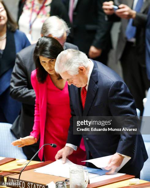Secretary of State Rex Tillerson arrives to attend a security council meeting on nonproliferation of North Korea next to US Ambassador to the United...