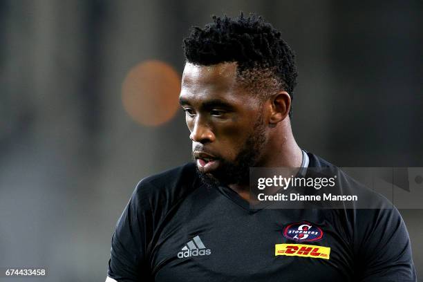 Siya Kolisi of the Stormers looks on during team warm up ahead of the round 10 Super Rugby match between the Highlanders and the Stormers at Forsyth...