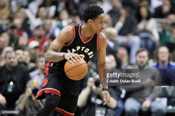 DeMar DeRozan of the Toronto Raptors dribbles the ball in the first quarter in Game Six of the Eastern Conference Quarterfinals against the Milwaukee...