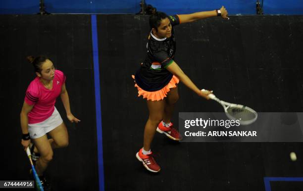 India's Dipika Pallikal plays a shot against Hong Kong's Liu Tsz Ling during their women's quarter-final match at 19th Asian Squash Championship in...