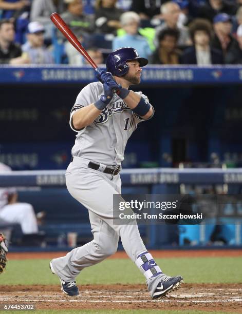 Kirk Nieuwenhuis of the Milwaukee Brewers lines out in the ninth inning during MLB game action against the Toronto Blue Jays at Rogers Centre on...