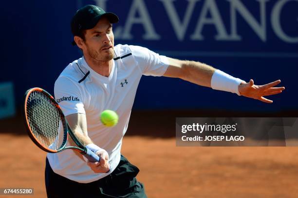 British tennis player Andy Murray returns the ball to Spanish tennis player Albert Ramos during the ATP Barcelona Open "Conde de Godo" tennis...