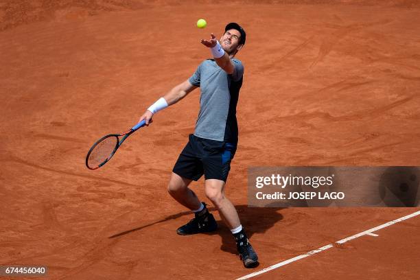 British tennis player Andy Murray serves to Spanish tennis player Albert Ramos during the ATP Barcelona Open "Conde de Godo" tennis tournament in...