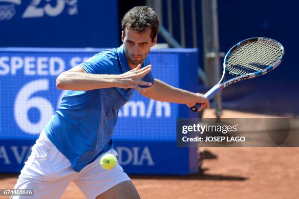 Spanish tennis player Albert Ramos returns the ball to British tennis player Andy Murray during the ATP Barcelona Open "Conde de Godo" tennis...