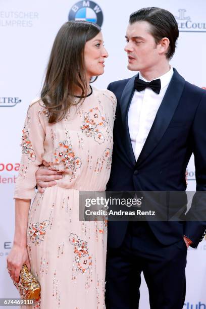 Alexandra Maria Lara and her husband Sam Riley attend the Lola - German Film Award red carpet at Messe Berlin on April 28, 2017 in Berlin, Germany.