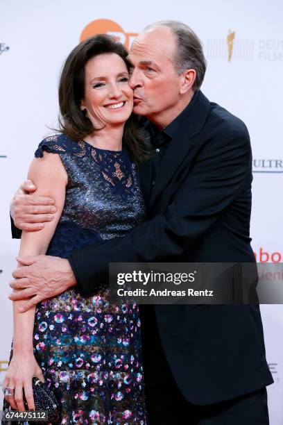 Herbert Knaup kisses his wife Christiane on the cheek during the Lola - German Film Award red carpet at Messe Berlin on April 28, 2017 in Berlin,...