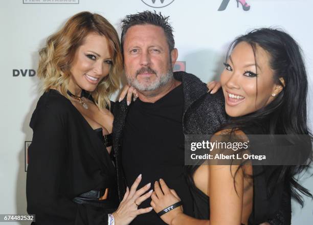 Actress Jessica Drake, director/husband Brad Armstrong and actress Asa Akira arrive for the 33rd Annual XRCO Awards Show held at OHM Nightclub on...