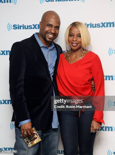 SiriusXM Host Caman Kelly and Mary J. Blige visit at SiriusXM Studios on April 28, 2017 in New York City.