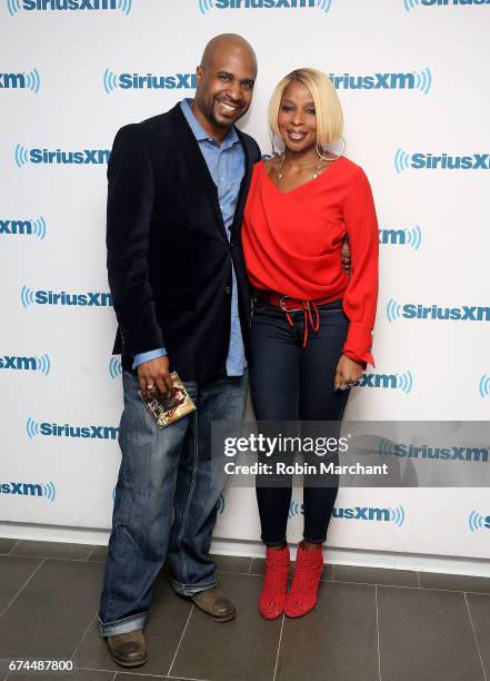 SiriusXM Host Caman Kelly and Mary J. Blige visit at SiriusXM Studios on April 28, 2017 in New York City.