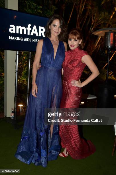 Katie Holmes and guest attends the 7th Annual amfAR Inspiration Gala on April 27, 2017 in Sao Paulo, Brazil.