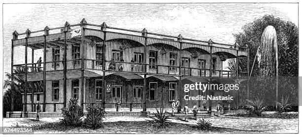 imperial administrative building in cameroon - low angle street stock illustrations