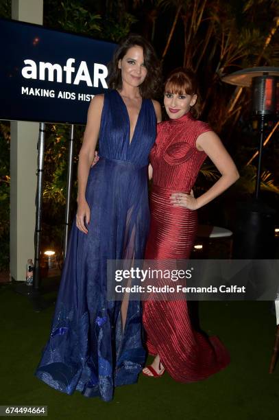 Katie Holmes and guest attends the 7th Annual amfAR Inspiration Gala on April 27, 2017 in Sao Paulo, Brazil.