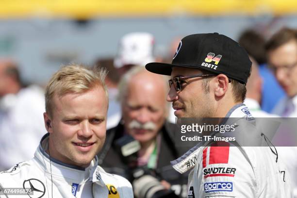 Felix Rosenqvist and and Maximilian Goetz looks on during the race of the DTM 2016 German Touring Car Championship at Nuerburgring on Septembmber 10,...