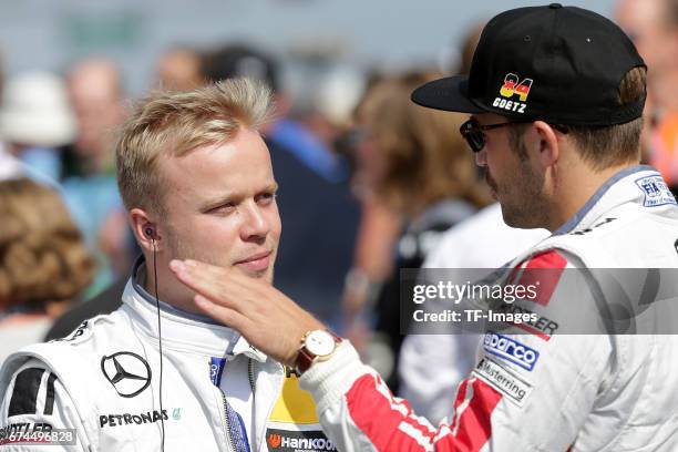 Felix Rosenqvist and and Maximilian Goetz looks on during the race of the DTM 2016 German Touring Car Championship at Nuerburgring on Septembmber 10,...