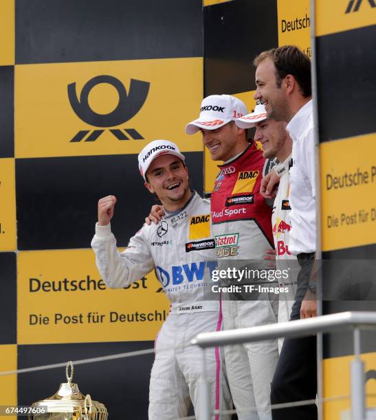 Lucas Auer, Edoardo Mortara and Marco Wittmann celebrates winning the second race of the DTM 2016 German Touring Car Championship at Nuerburgring on...