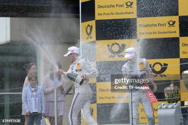 Lucas Auer, Edoardo Mortara and Marco Wittmann celebrates winning the second race of the DTM 2016 German Touring Car Championship at Nuerburgring on...