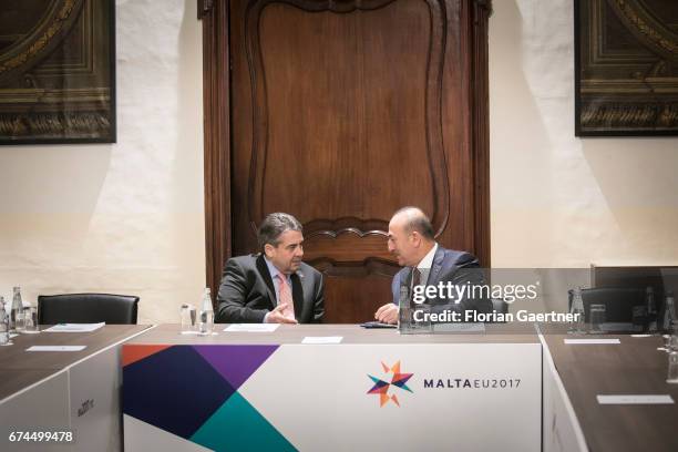 German Foreign Minister and Vice Chancellor Sigmar Gabriel talks with Mevluet Cavusoglu, Foreign Minister of Turkey, at the Gymnich Meeting on April...