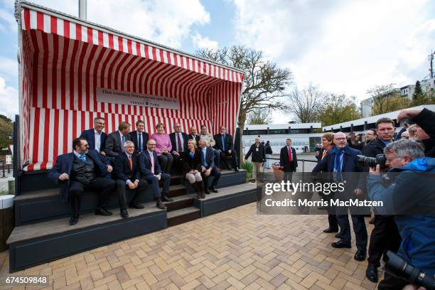 German Chancellor and Chairwoman of the German Christian Democrats Angela Merkel, and local CDU members and park representetives are pictured as they...