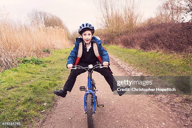 cycling home from school - feet on table bildbanksfoton och bilder