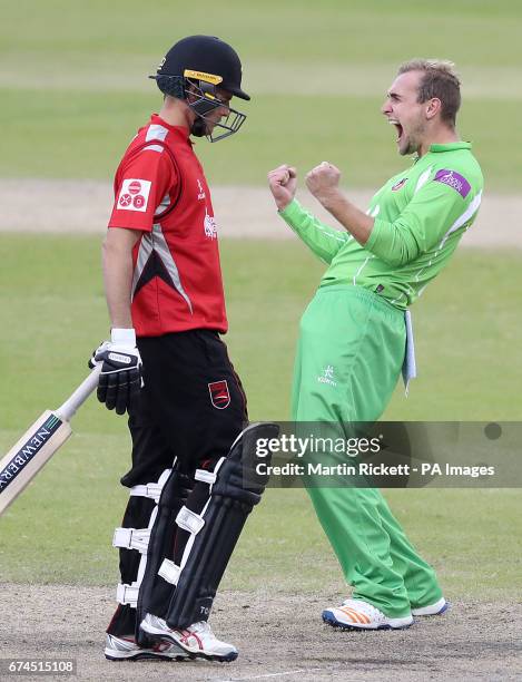 Lancashire's Liam Livingstone celebrates taking the wicket of Leicestershire's Neil Dexter , during the Royal London One Day Cup match at Old...
