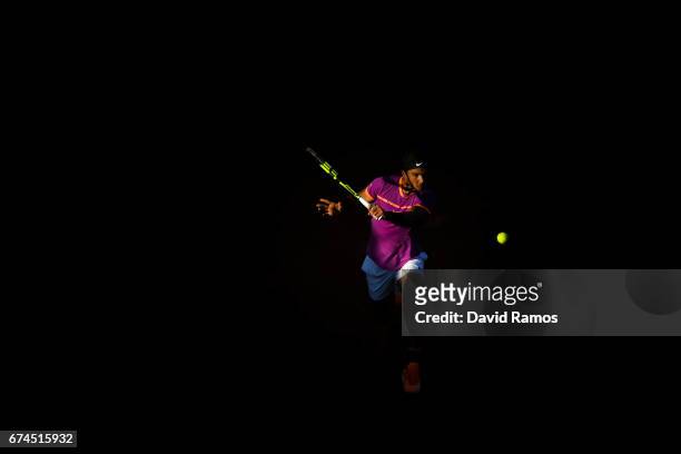 Rafael Nadal of Spain plays a backhand against Hyeon Chung of South Korea in the quarterfinal on day five of the Barcelona Open Banc Sabadell on...