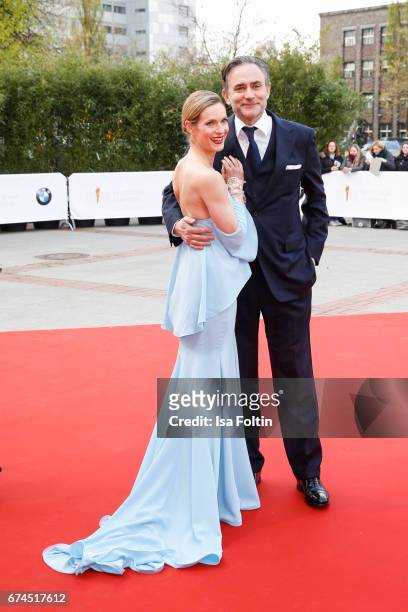German actress Lisa Martinek and her husband Giulio Ricciarelli during the Lola - German Film Award red carpet arrivals at Messe Berlin on April 28,...