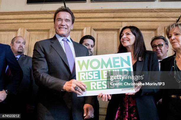 Mayor of Paris Anne Hidalgo receives Former Governor of California and current Founding President of Regions of Climate Action Arnold Schwarzenegger...