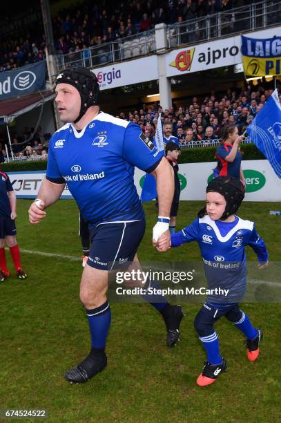 Dublin , Ireland - 28 April 2017; Mike Ross of Leinster runs out with his son Kevin prior to the Guinness PRO12 Round 21 match between Leinster and...