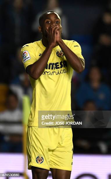 Villarreal's Congolese forward Cedric Bakambu gestures after missing an attempt on goal during the Spanish league football match Villarreal CF vs...