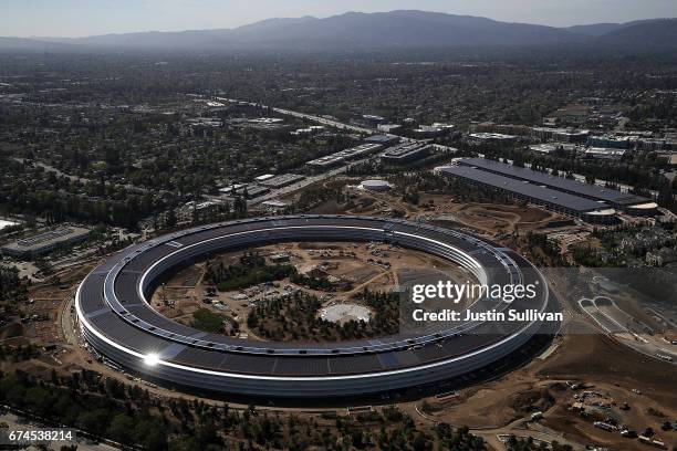 An aerial view of the new Apple headquarters on April 28, 2017 in Cupertino, California. Apple's new 175-acre 'spaceship' campus dubbed "Apple Park"...