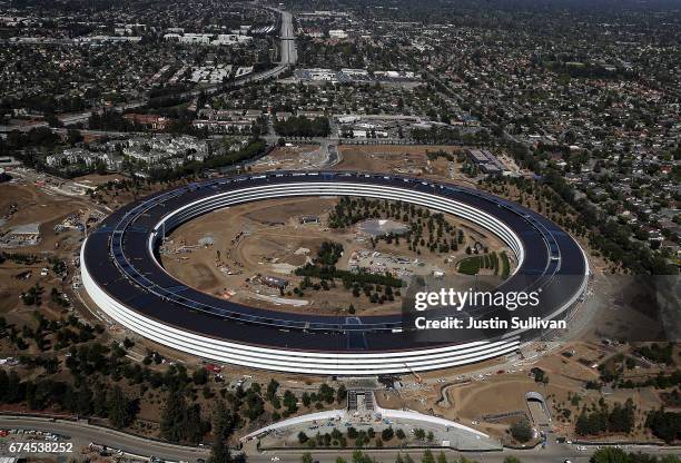 An aerial view of the new Apple headquarters on April 28, 2017 in Cupertino, California. Apple's new 175-acre 'spaceship' campus dubbed "Apple Park"...